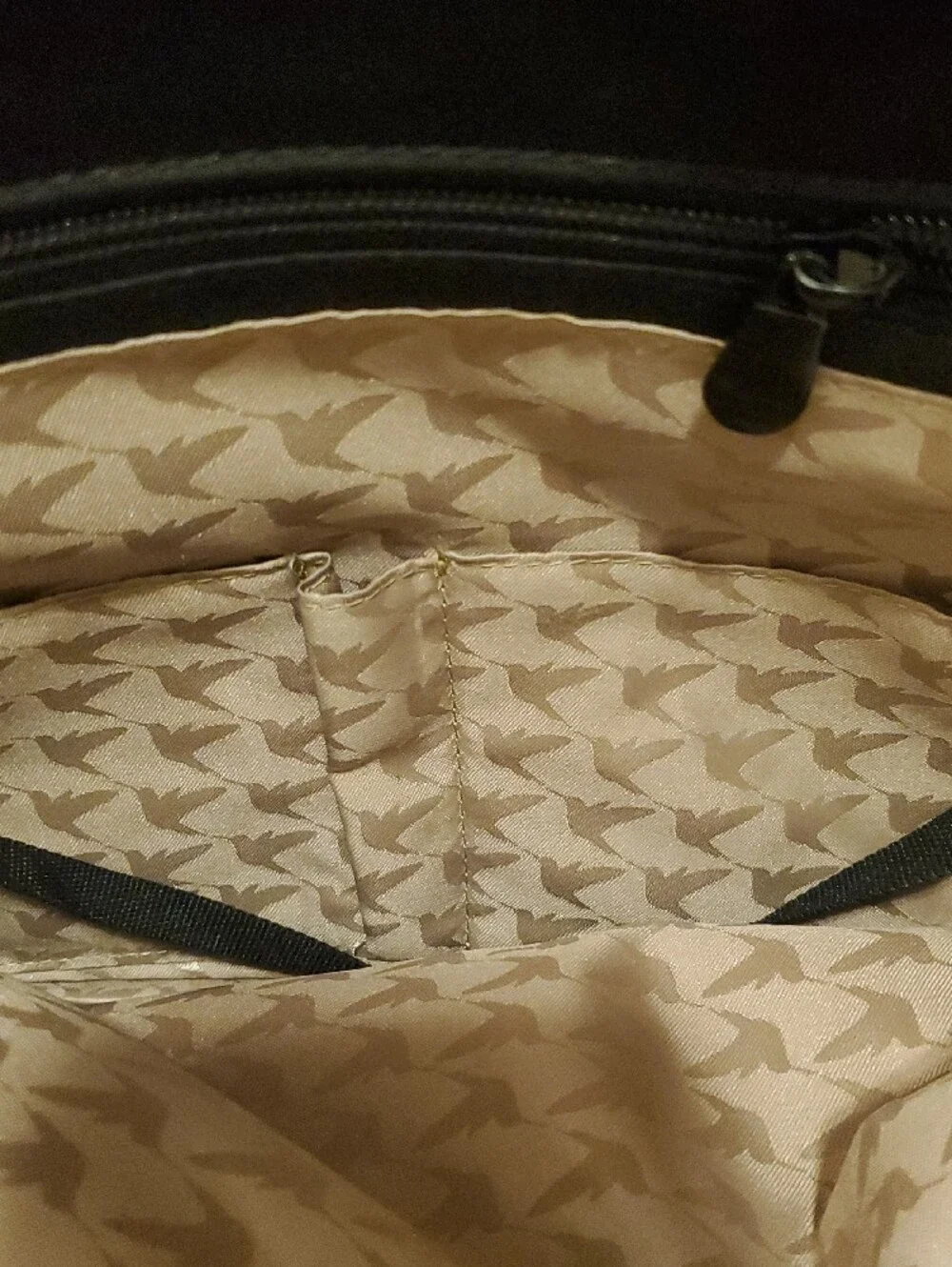 Lo & Sons Black Backpack with Gold Zipper Accents